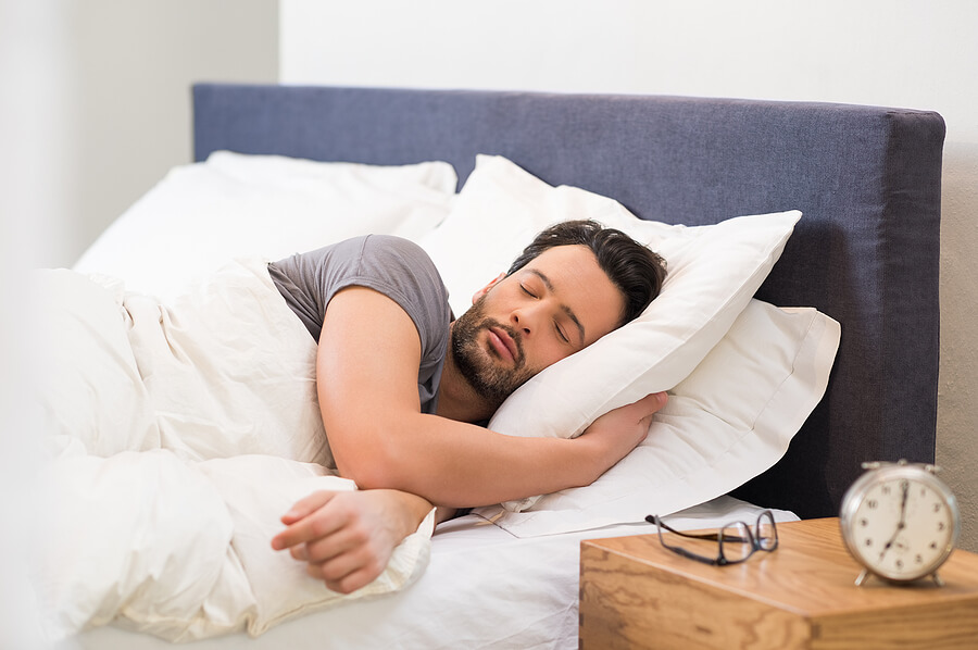 A man sleeping in bed