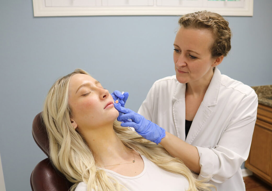 A Scotch ENT clinician providing facial care